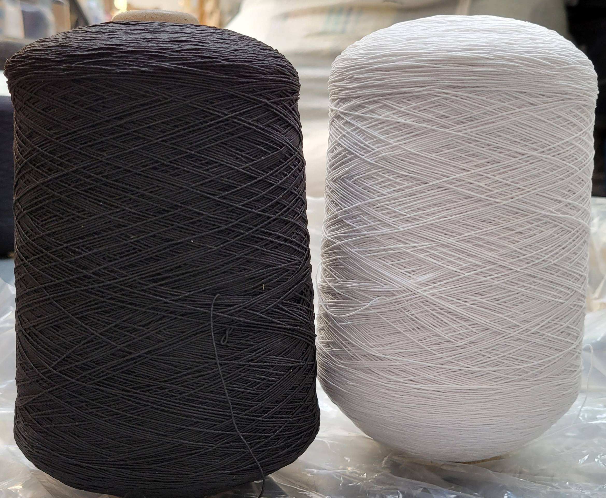 Conos de hilado de goma forrada